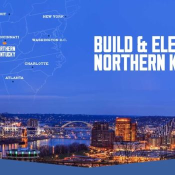 Blue hero image with a map of Northern Kentucky on the left and a nighttime Cincinnati riverfront skyline on the right, featuring the white slogan 'Build & Elevate Northern Kentucky'