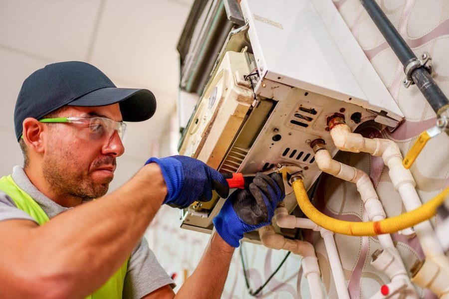 Professional gas line installation in a home.