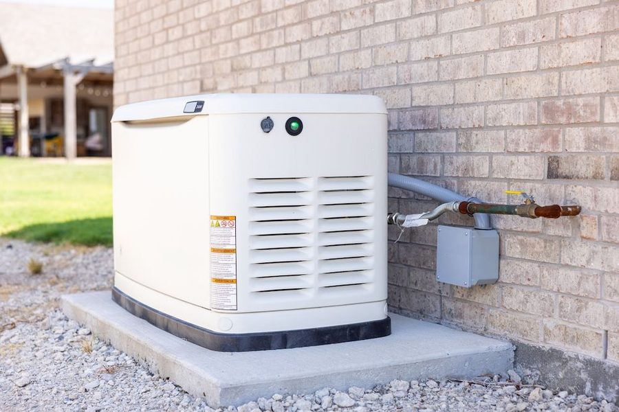 A dependable backup generator installed outside a home.