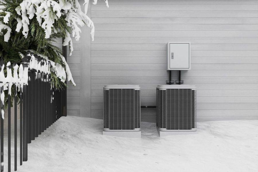 HVAC system keeping your home warm in the winter snow.