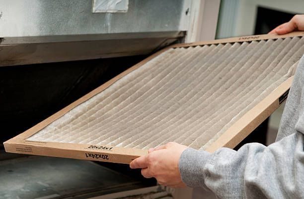 Dirty AC filter showing a need for better indoor air quality.