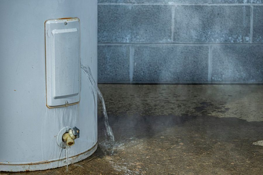 Water heater leaking a lot of water on the floor of the home.